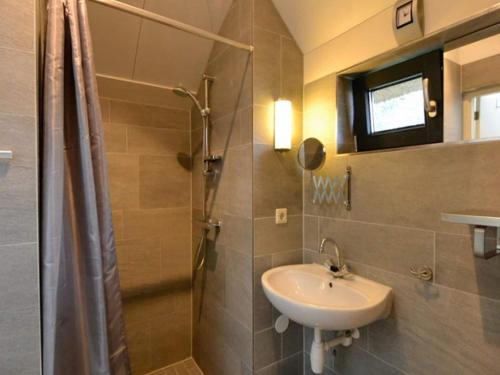 Ένα μπάνιο στο Apartment in Netherlands near the Coast