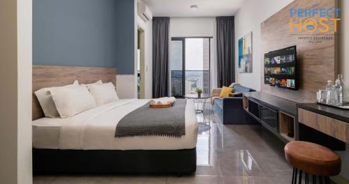 Cama o camas de una habitación en Imperio Residence Seafront by Perfect Host