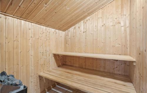a wooden sauna with a wooden shelf in it at Stunning Home In Fjerritslev With Wifi in Fjerritslev