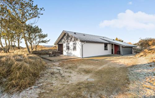 a house on the side of a hill at Amazing Home In Fanø With Wifi in Fanø