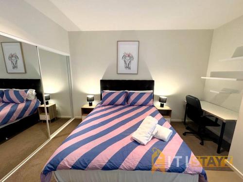 Ένα ή περισσότερα κρεβάτια σε δωμάτιο στο Pretty Penthouse - Close to ANU