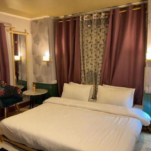 Katil atau katil-katil dalam bilik di Sumdo saspochey farmstay