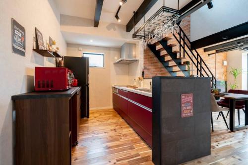 Una cocina o cocineta en Manhattan Hills富山