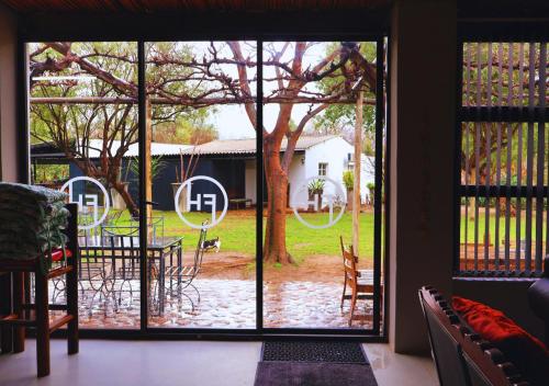 a sliding glass door with a view of a yard at Fossil Hills in McGregor
