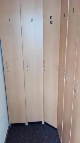 a room with four lockers with numbers on them at Pension Borůvka in Špindlerův Mlýn