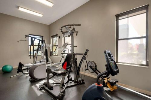 a gym with several exercise bikes and a window at Days Inn by Wyndham Carbondale in Carbondale