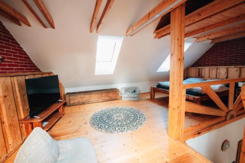 an overhead view of a room with bunk beds at Podklášterský domek in Třebíč