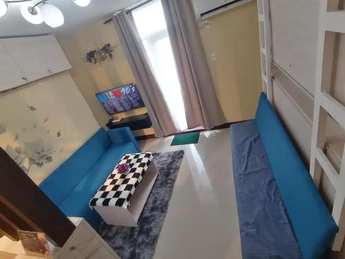 TV a/nebo společenská místnost v ubytování Meraki Space cozy studio unit near mactan airport with balcony