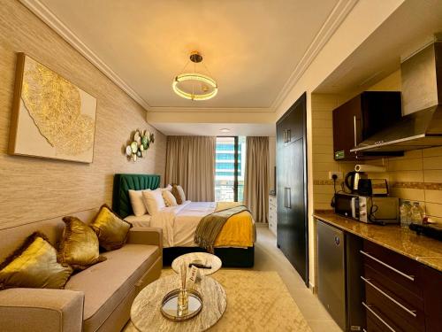 Cosmos Living Sleek and Stylish Studio with Balcony