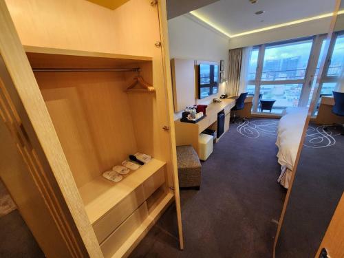 TV a/nebo společenská místnost v ubytování K Hotel Taipei Songjiang