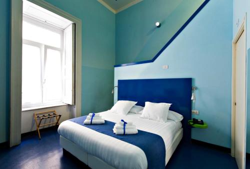 Posteľ alebo postele v izbe v ubytovaní Correra 241 Lifestyle Hotel