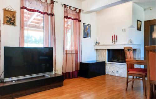 TV a/nebo společenská místnost v ubytování Three-Bedroom Holiday Home In Dicmo