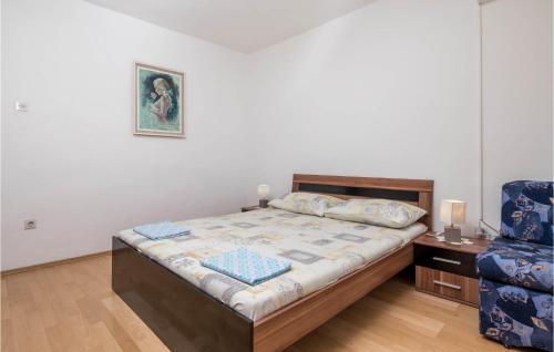 Ένα ή περισσότερα κρεβάτια σε δωμάτιο στο Nice Apartment In Bosana-Pag With Wifi