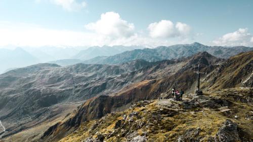 a group of people standing on top of a mountain at Hotel Englhof in Zell am Ziller