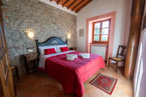 Ένα ή περισσότερα κρεβάτια σε δωμάτιο στο Agriturismo Badia Ficarolo