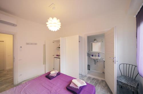 Posteľ alebo postele v izbe v ubytovaní GuestHouse La Viola