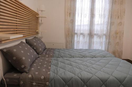Ένα ή περισσότερα κρεβάτια σε δωμάτιο στο Cremona SUITE PAD