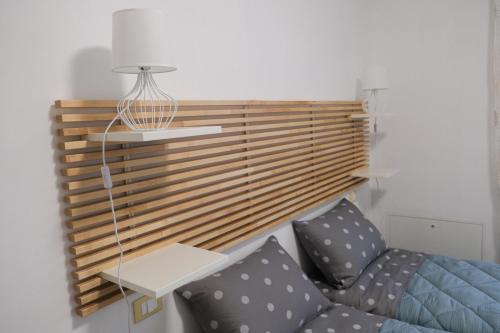 Ένα ή περισσότερα κρεβάτια σε δωμάτιο στο Cremona SUITE PAD