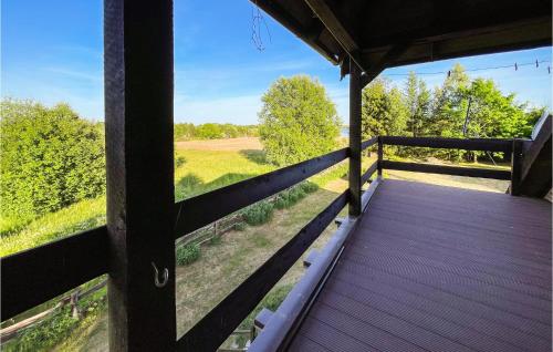 Un balcon sau o terasă la Holiday Home Lidzbark Warminski Haus Am See Klebowo