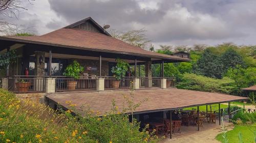 Een tuin van Kwezi Cottage at The Great Rift Valley Lodge & Golf Resort Naivasha