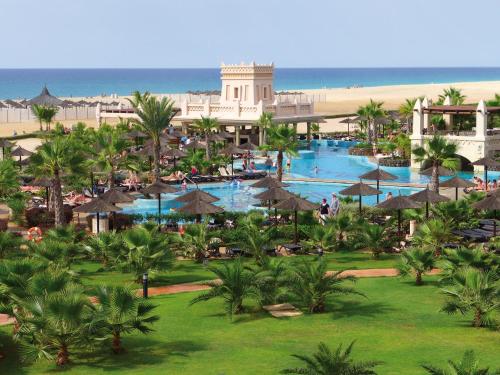 an aerial view of a resort with a swimming pool at Hotel Riu Touareg - All Inclusive in Curral Velho