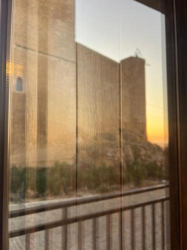 a window with a view of a city at A cantunera o castieddu in Naro