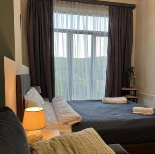 Kechi House Apartment 132にあるベッド