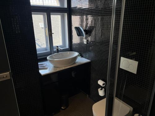 Koupelna v ubytování Hotel Praha Liberec