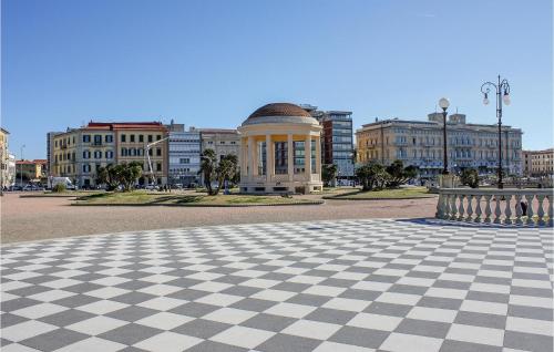 a checkered floor in front of a large building at Cozy Apartment In Castell'anselmo in Castell’Anselmo
