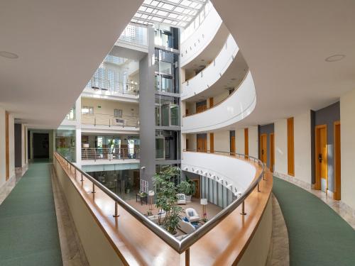 an internal view of a building with a glass ceiling at Hotel Fuerte Conil-Resort in Conil de la Frontera