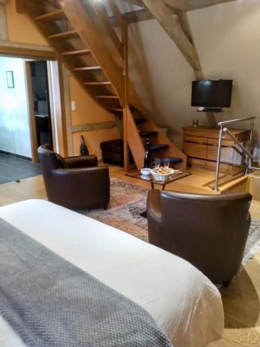 TV a/nebo společenská místnost v ubytování Maison Rebleuthof Sauna & Fitness