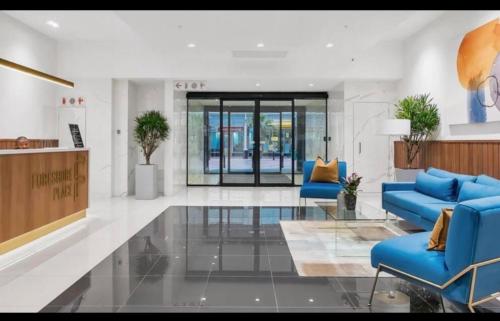 Posezení v ubytování 1 Bedroom Modern Apartment Foreshore Place CBD