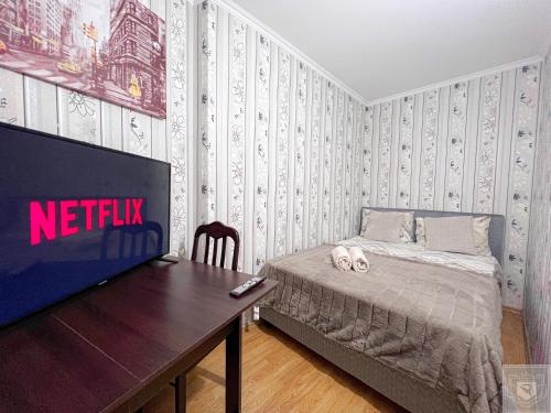Ένα ή περισσότερα κρεβάτια σε δωμάτιο στο RentHouse Apartments Metropolis