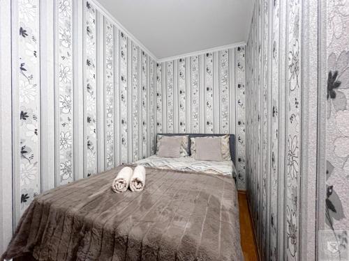Ένα ή περισσότερα κρεβάτια σε δωμάτιο στο RentHouse Apartments Metropolis