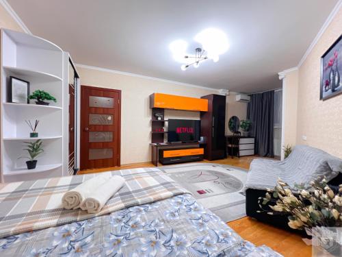 Ένα ή περισσότερα κρεβάτια σε δωμάτιο στο RentHouse Apartments Metropolis