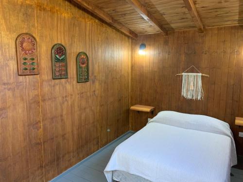 Postel nebo postele na pokoji v ubytování Refugio Ventana