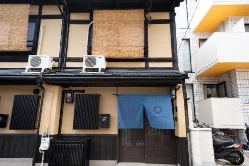 a building with two speakers on the side of it at JPRESERVE Fuji in Nishinotōindōri