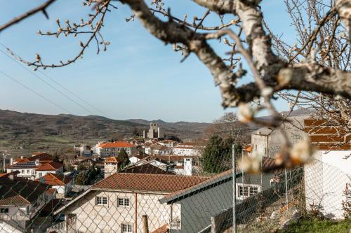 a view of a city from a tree at Casa da Corujeira - Montalegre in Montalegre