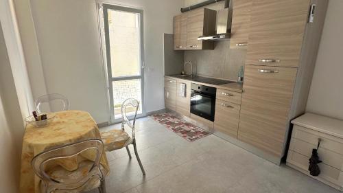 Η κουζίνα ή μικρή κουζίνα στο Orte Holiday - Inaugurazione Agosto 2024