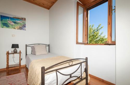 Ένα ή περισσότερα κρεβάτια σε δωμάτιο στο Villa MarFo Natural Park by "elite"