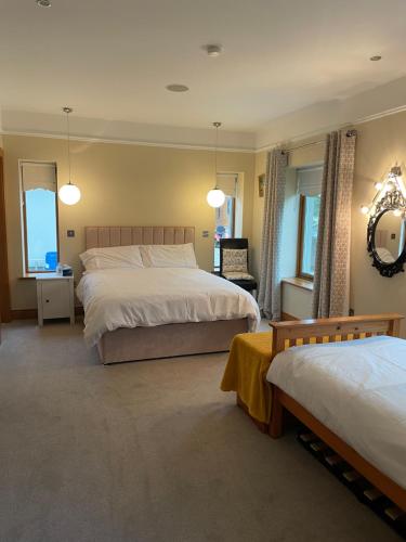 Postel nebo postele na pokoji v ubytování Laithreach Briuin B&B W23E0H9