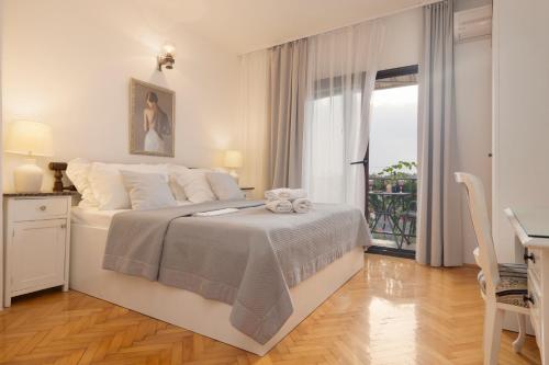 Voodi või voodid majutusasutuse Apartments Bose toas
