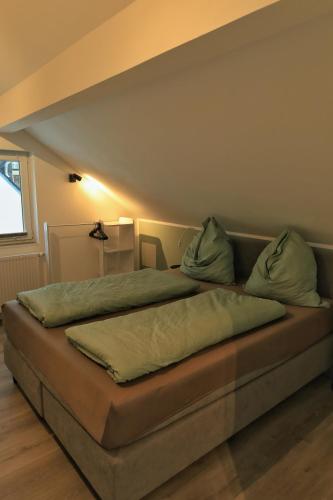 Ferienwohnung Weinsにあるベッド