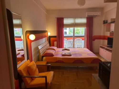Ohrid Lake Studio tesisinde bir odada yatak veya yataklar