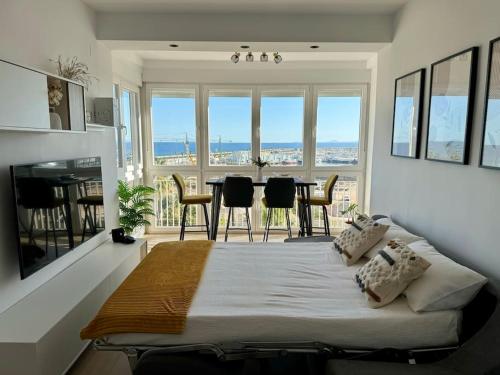 Ένα ή περισσότερα κρεβάτια σε δωμάτιο στο Cozy apartment with port view