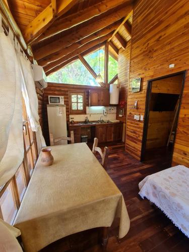 Letto o letti in una camera di Cabañas La Ponderosa