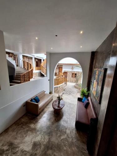 Ένα ή περισσότερα κρεβάτια σε δωμάτιο στο Casa Pelícano -suite albatros-