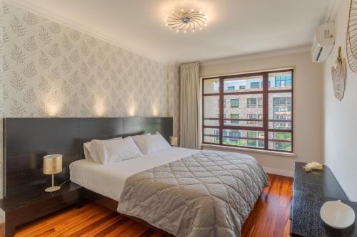 Postel nebo postele na pokoji v ubytování Stay In Avenue Arriaga 10