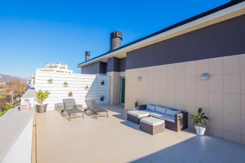 Rodamar Penthouse, by Pausa Holiday Rentals
