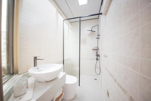 Koupelna v ubytování Meizhou Island Lijia Xiaoyuan B&B